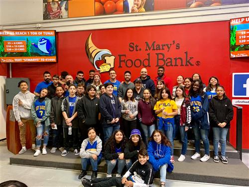 students volunteer at the food bank